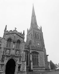 Low angle view of temple against building