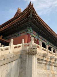 Low angle view of temple building against sky