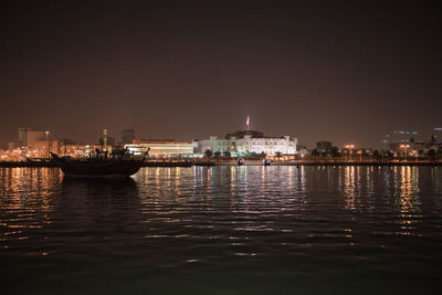 Illuminated buildings in city at night