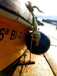 Close-up of rope hanging on boat