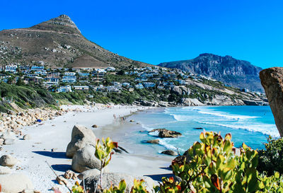 Scenic view of sea against clear blue sky