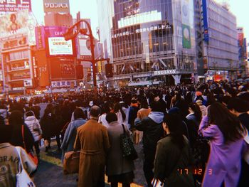 Crowd of people in city