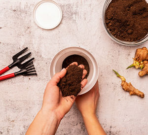 High angle view of person preparing food on table