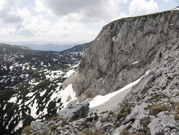Scenic view of mountains against sky during winter
