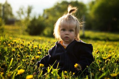 Portrait of girl on field