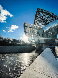 Scenic view of louis vuitton foundation against sky