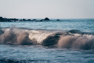 Scenic view of sea against clear sky
