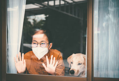 Portrait of man with dog