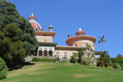 Temple against clear blue sky