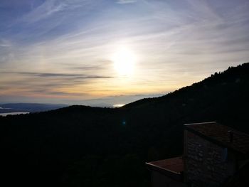 Scenic view of mountains against sky during sunset