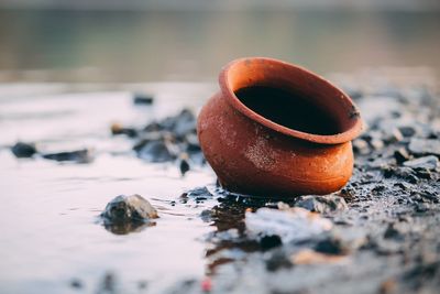 Close-up of pot in water