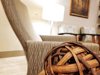 Close-up of wicker basket on table at home