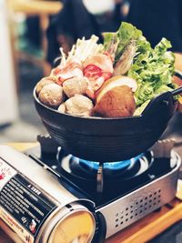 Close-up of food in pan on stove