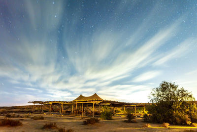 Long exposure of stars. the milky way galaxy. night accommodation in the desert, israel