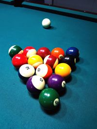 Multi colored balls on table