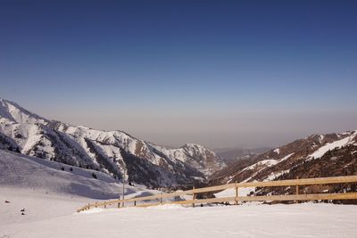 Scenic view of snow covered mountains