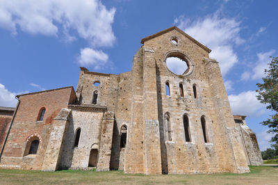 Low angle view of old building against sky