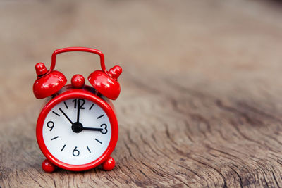 Close-up of clock on table