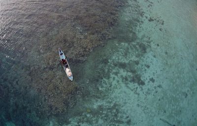 High angle view of man in boat on sea