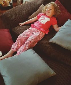 High angle view of two people sitting on table