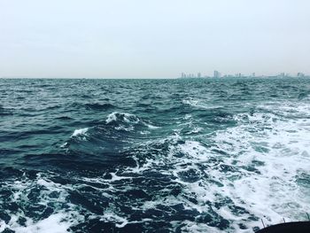 Scenic view of sea against clear sky