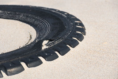 High angle view of camera on sand