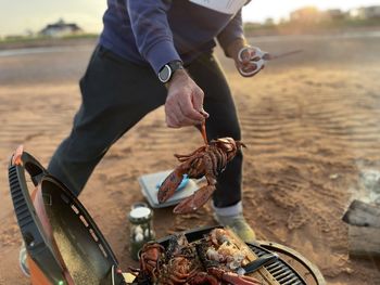 Lobster supper on the barbecue at cape tormentine beach in new brunswick, canada.