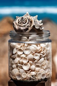 Close-up of glass jar on table