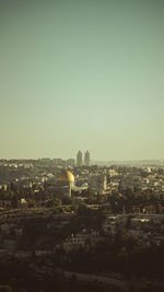 Cityscape against clear sky