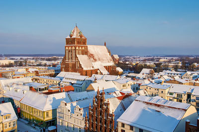 High angle view of townscape against sky in city