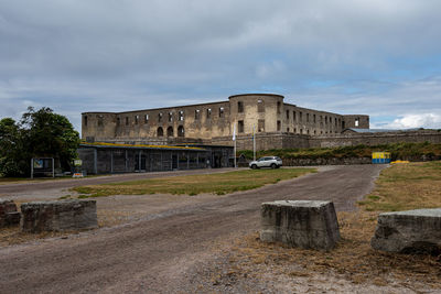 An old castle with a dramatic sky in the background