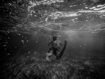 Man swimming in sea