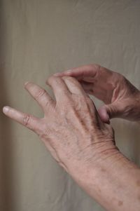 Midsection of couple hands