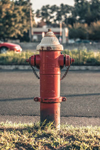 Close-up of fire hydrant on street against sky