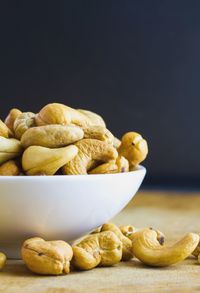 Close-up of cashew nuts on table