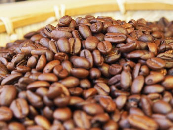 Close-up of coffee beans on table