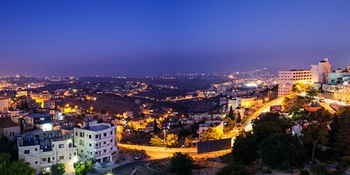 Aerial view of illuminated cityscape