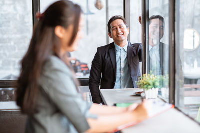 Business colleagues working at office