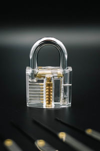 Close-up of padlock on table