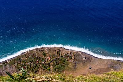 High angle view of beach against blue sky