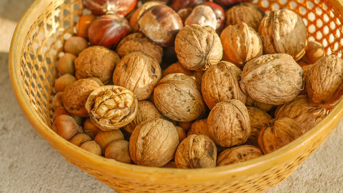 High angle view of walnuts in basket