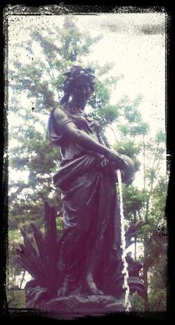 transfer print, auto post production filter, tree, statue, day, standing, nature, low angle view, outdoors, rear view, sculpture, human representation, long hair, growth, waist up, plant, lifestyles, three quarter length