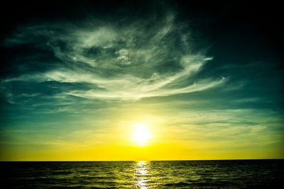 Scenic view of sea at sunset