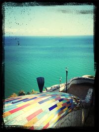 Scenic view of sea against blue sky