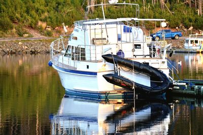 Boat moored at harbor