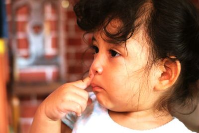 Close-up of cute boy eating food