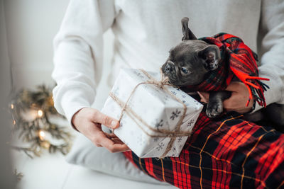 Midsection of man with dog