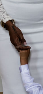 Close-up of woman holding hands