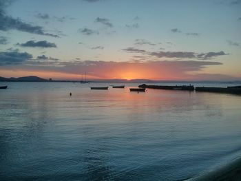 Scenic view of sea at sunset