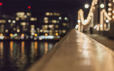 Defocused image of illuminated street lights at night